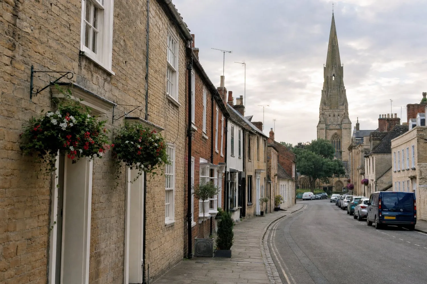A quiet street of stone and brick cottages in Towcester, Northamptonshire